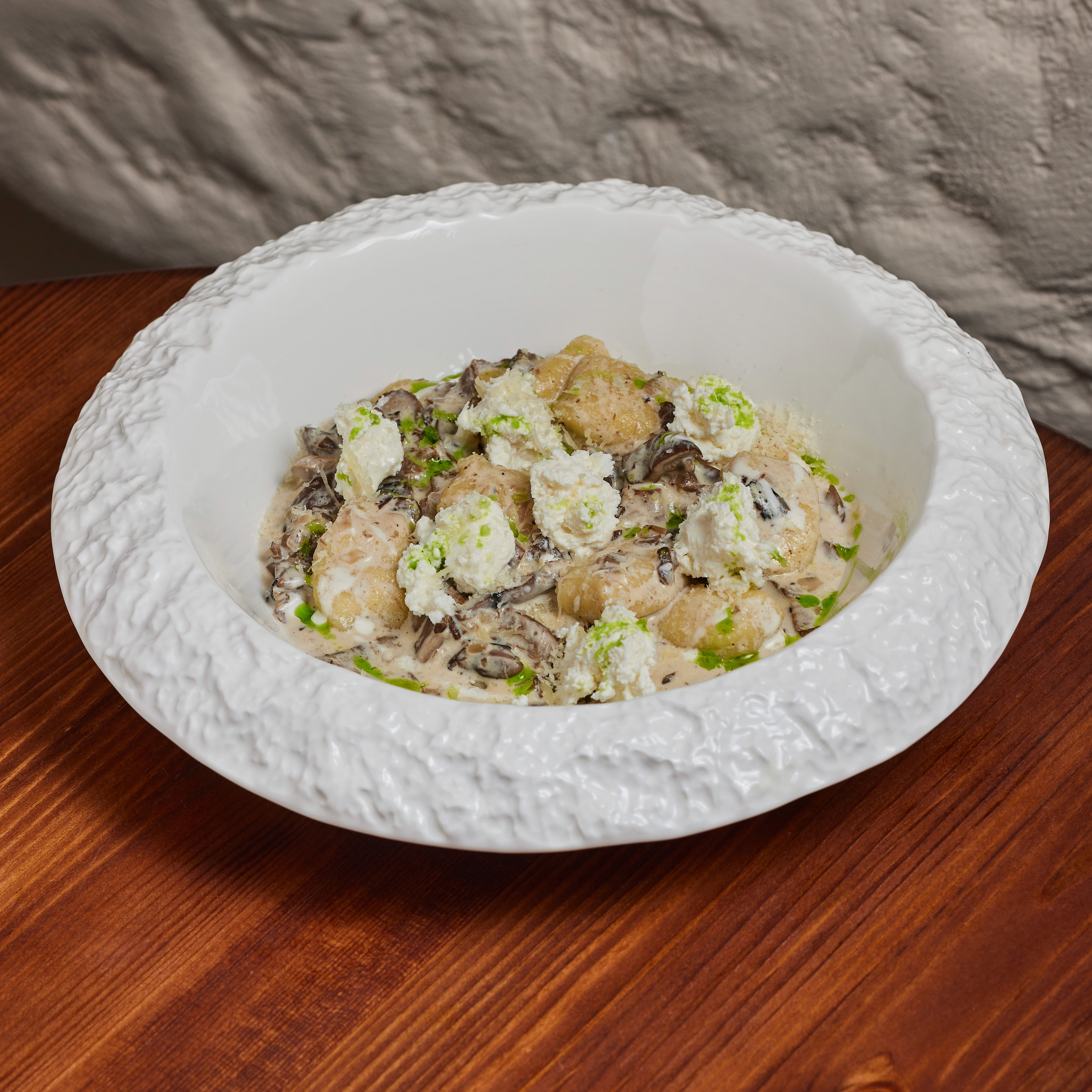 Potato gnocchi with mushrooms and parmesan