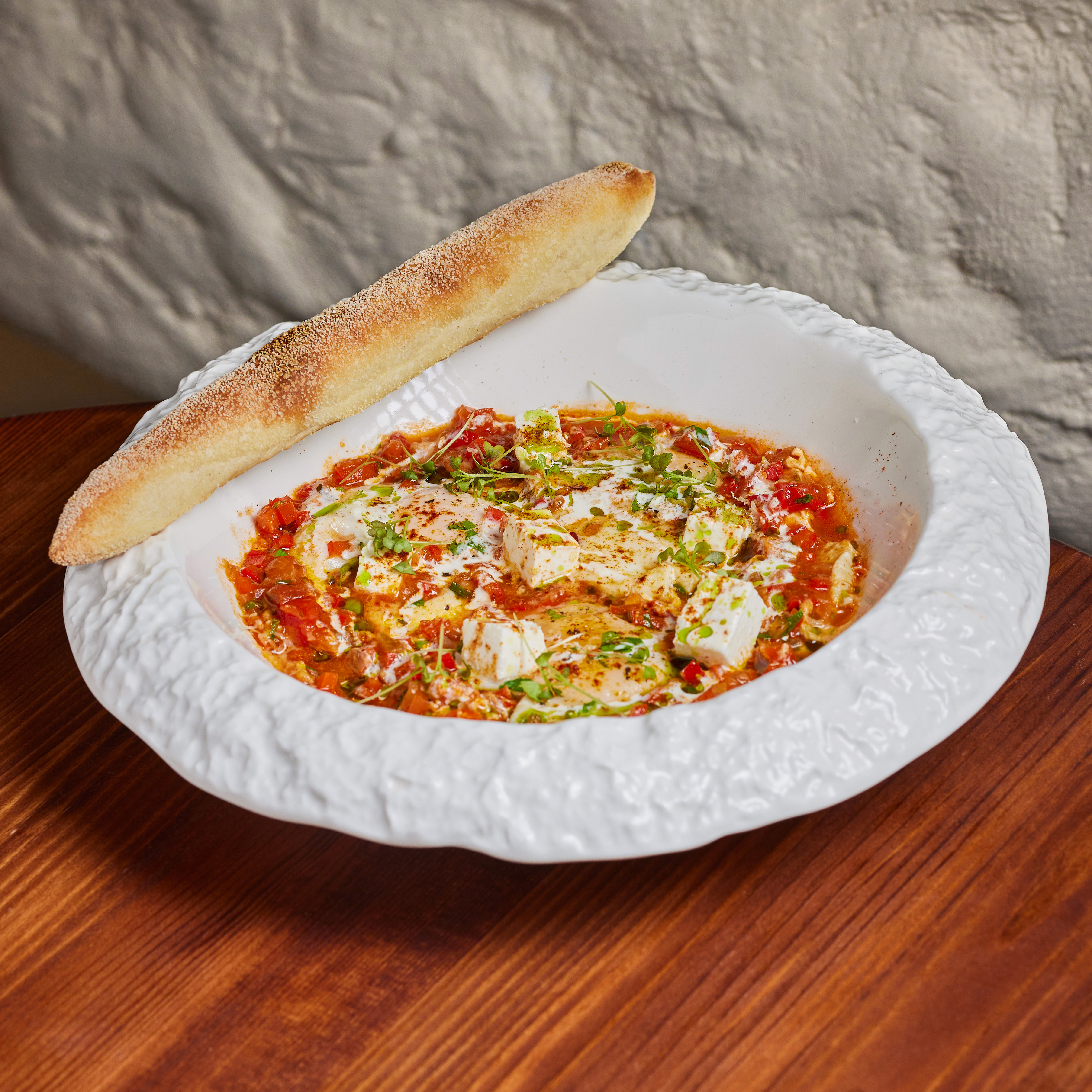 Shakshuka with stewed vegetables and smoked feta